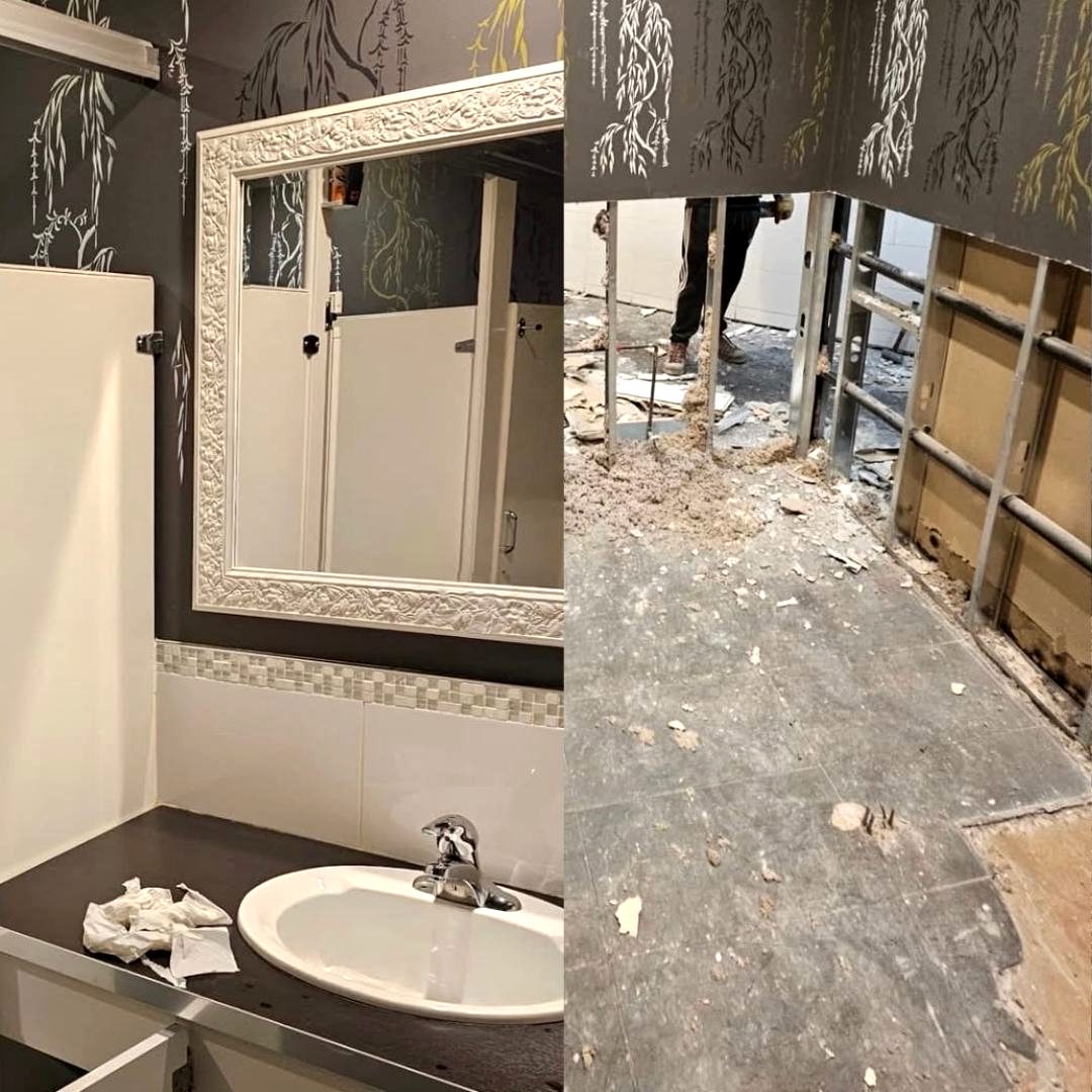 Commercial washroom gutted to studs with every finish removed