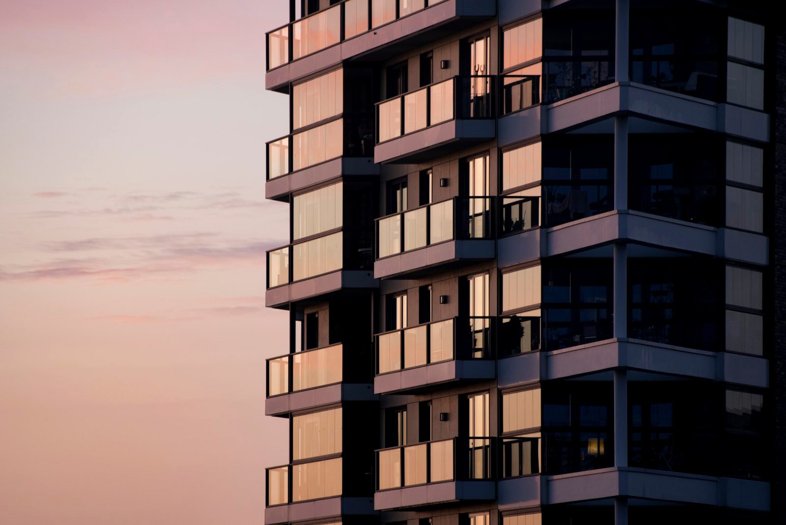 Modern multi-residential building at dusk